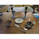 A selection of silver to include a pair of neo-classical inspired candlesticks, Birmingham