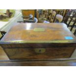 A 19th century brass inlaid rosewood writing box with fitted interior