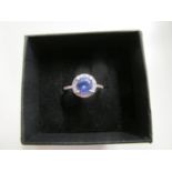 9ct white gold tanzanite and diamond cluster ring, boxed, Tanzanite 1.20ct approximately, Diamonds