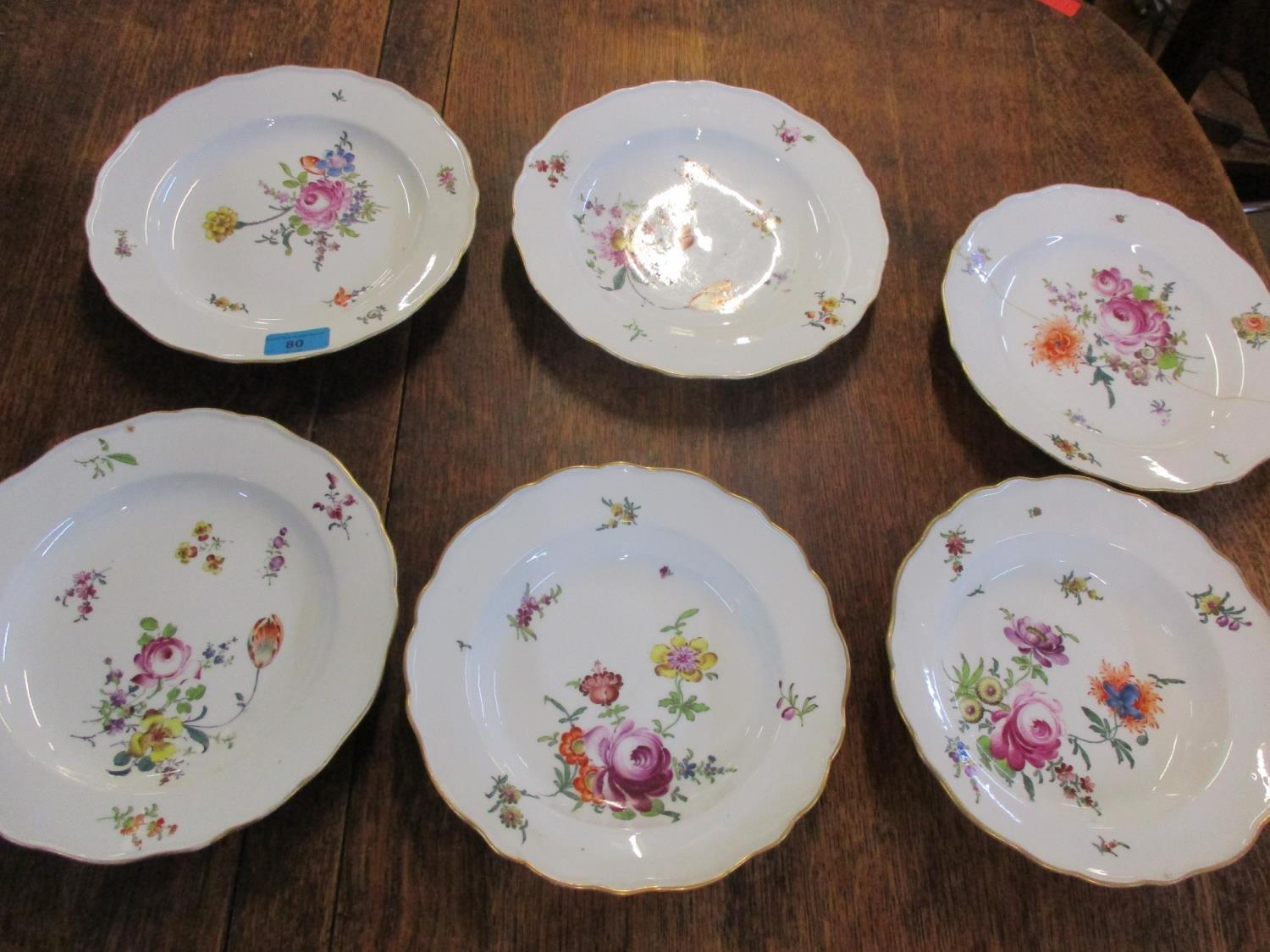 Four Meissen shallow bowls together with two smaller and deeper bowls (Condition: one shallow bowl