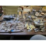 A mixed lot of silver plate to include trays and cutlery