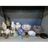 A mixed lot of Chinese and Japanese ceramics, along with Chinese cloisonné ornaments and carved