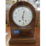 An Edwardian mahogany inlaid arch topped, eight day movement, mantle clock with three keys Location: