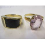 A gents 14ct, black stone and diamond chip ring, 5.1g together with a yellow metal and pink sapphire