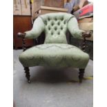 A Victorian walnut armchair with a button upholstered back, barley twist supports and legs, on