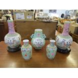 A group of mid century and later Chinese porcelain vases to include a twin handles vase