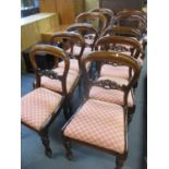 A set of six Victorian mahogany chairs together with four matched reproduction carvers, in a