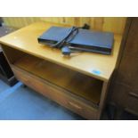 A Retro G-Plan teak television unit on castors together with a Sony DVD player and SCART cable