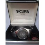 A gents Sicura automatic wristwatch with original box A/F