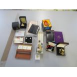 A selection of jewellery and other items to include silver cufflinks, and an Angelus three some,