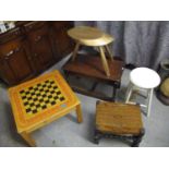 Small furniture to include two stools, an oak occasional table, a gold painted table and a games
