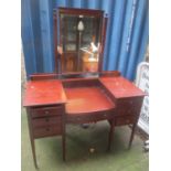 A 20th century mahogany dressing table, the locks inscribed 'Especially Made for Waring & Gillow Ltd