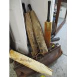 A leather Gladstone cricket bag containing a Stuart Surridge & Co Ltd patent rapid driver cricket