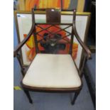 Circa 1900, a mahogany Sheraton Revival lattice back armchair