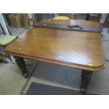 A Victorian mahogany extending dining table on fluted tapering legs 74cm h x 172cm w extended