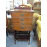 An Edwardian walnut music cabinet, four drawers over an open storage space 112 x 50.5 x 36cm