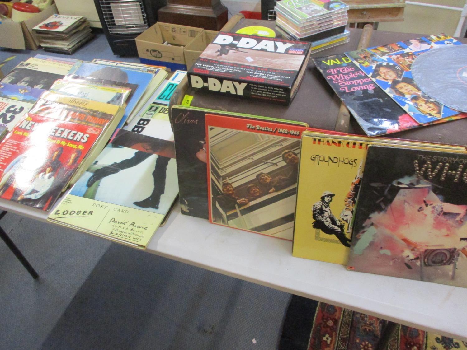 A vintage trunk together with compilation cd's and mixed records 1960's-1980's to include The