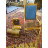 An Edwardian mahogany framed rocking chair, a Victorian dressing mirror and a cased Singer sewing