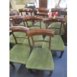 A set of eight early 19th century mahogany bar back dining chairs on turned front legs