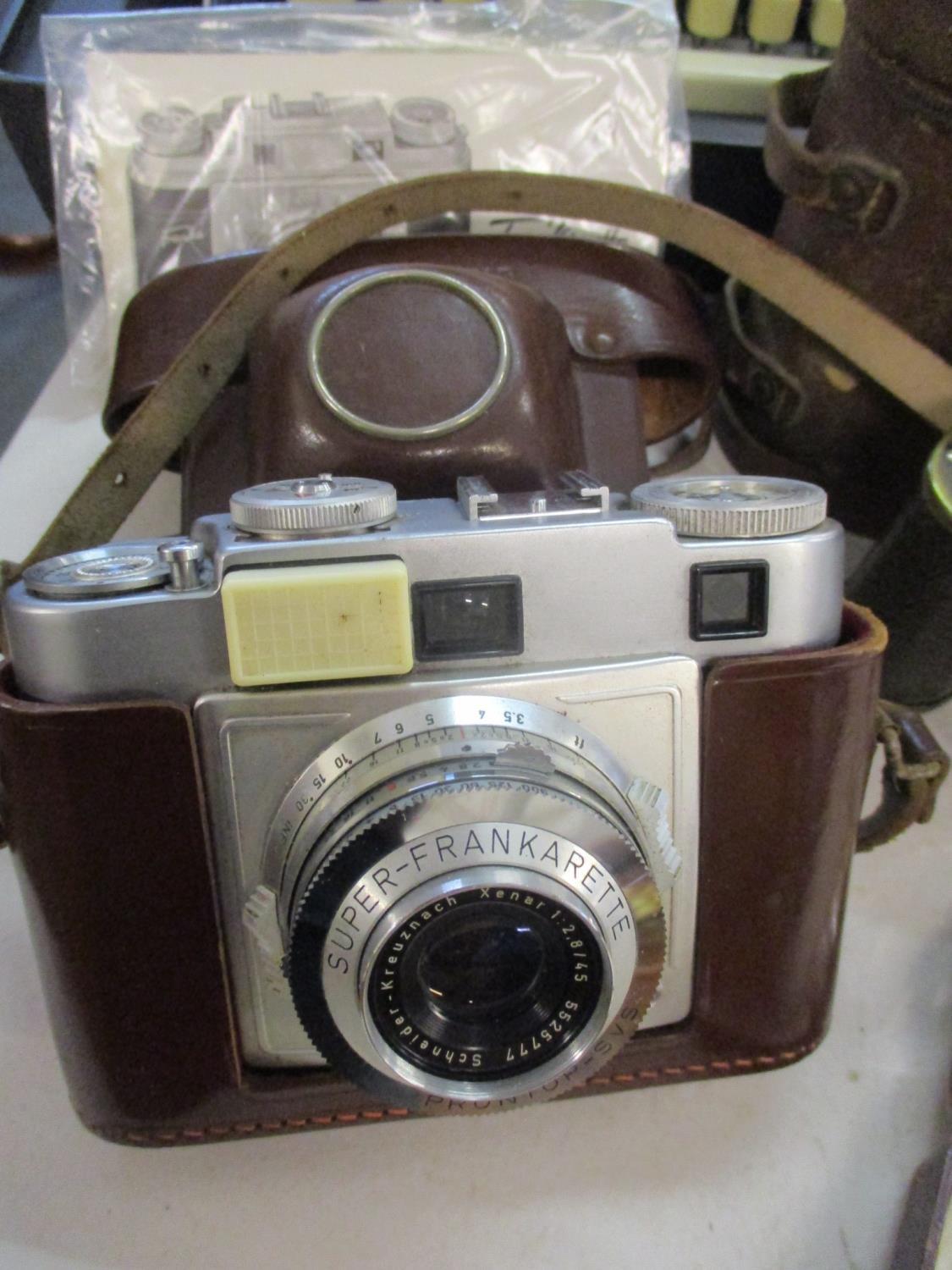 A 1913 pair of Prismatic Binocular No.3 binoculars, Ross, London and leather travelling case - Image 2 of 5