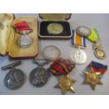 A selection of British and other medals to include a Meritorious Service medal inscribed Gordon