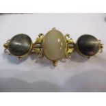 A 15ct gold, agate and grey hardstone bar brooch, total weight 8.6g
