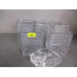 Five matching clear glass hobnail glass vases together with a Mats Jonasson engraved lead crystal