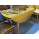 Light elm and beech fall flap table, possibly by Ercol, together with set of four Ercol style hoop