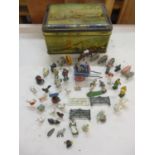 A quantity of lead and other figures and models, mainly farm animals, housed in a vintage tin box