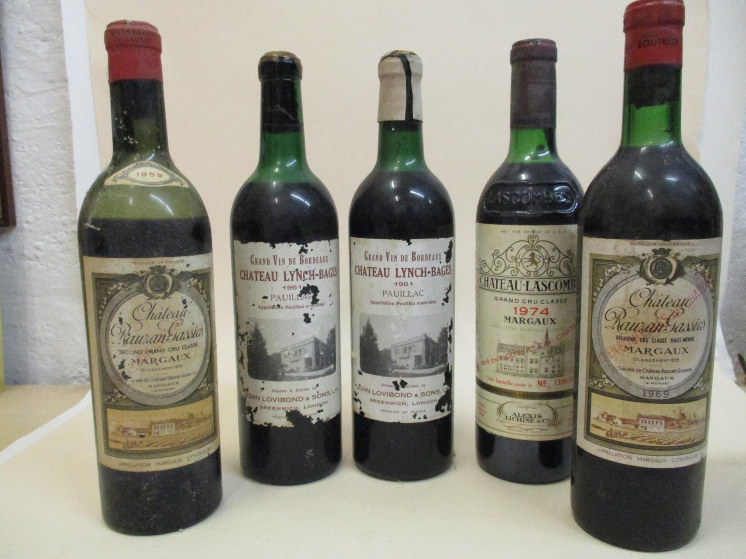 Two bottles of Chateau Lynch-Bages 1961 Pauillac, one bottle of Chateau-Lascombe 1974 Margaux, two
