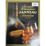 One boxed Grand Armagnac Janneau Fondateur VSOP with two brandy glasses