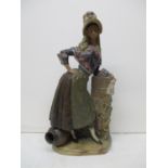 A large Lladro gres model of a country girl 'Mujer de Montehermoso', modelled as a provincial maiden
