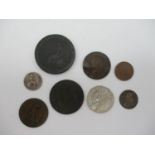 A small collection of coins, to include a Charles II silver 1679 maundy threepence, a George II half