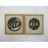 Two 19th century Japanese iron marubori tsuba, one modelled with a crane, 8 cm diameter, together