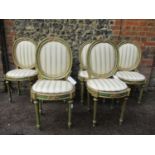 A set of six Italian medallion salon chairs, with gilt varnished silvered 'mecca' and green paint,