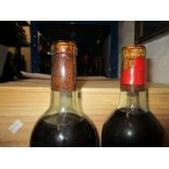 Two bottles of Chateau Doisy-Vedrires 1964 Barsac and 50th Anniversary 115 Squadron bottle table
