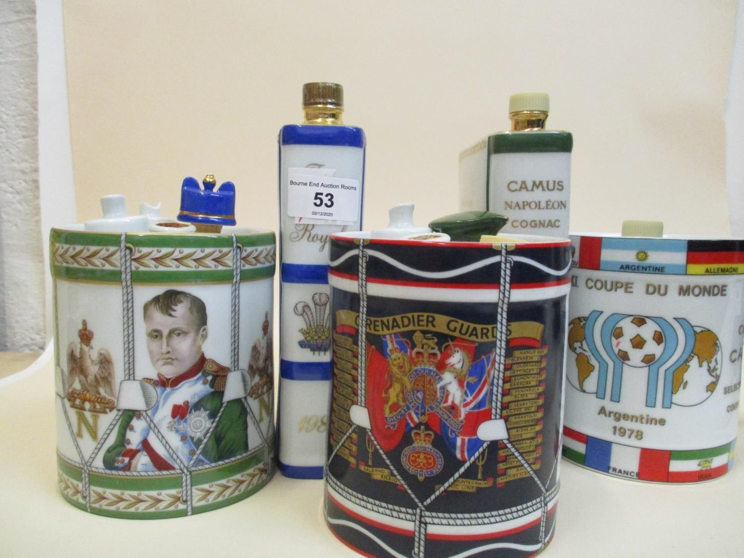 Five ceramic flasks to include Grenadier Guards and miscellaneous stoppers, drum, Napoleon Drum