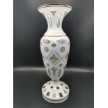 A late 20th century Murano glass overlay vase, of baluster form with everted rim, the opaque white