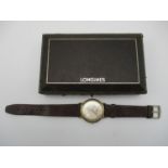 A Longines Flagship automatic watch with 9ct gold case, and brown leather strap