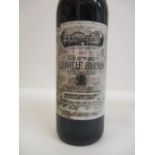 12 Bottles of Chateau Leoville Barton 1982, labels damage, ullage base of neck