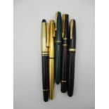 A collection of vintage fountain pens, to include a gold plated Sheaffer fountain pen with 14 ct
