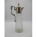 A late 20th century silver mounted claret jug, London 1978, the pourer shaped a figural mask, the