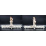 A pair of Victorian Royal Worcester centrepiece vases by Philips and Pearce, each in a trough style,