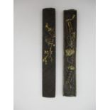 Two 19th century Japanese kozuka, one iron model with textured woven effect, depicting a pavilion,