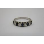 An 18ct white gold, diamond and sapphire half eternity ring, set with five sapphires and four