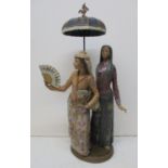 A large Lladro gres twin model titled 'Folklore Filipino', modelled as two elegant women under a