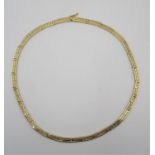 An 18ct gold Greek key pattern necklace, with rigid links, 14 cm circumference, 24.7 g