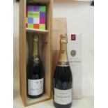 One bottle of Laurent-Perrier Champagne, boxes and one bottle of Berry Bros and Rudd Champagne