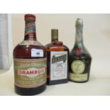 Three liqueur bottles - Dom Benedictine, Cointreau and Drambuie Prince Charles Edwards liqueur