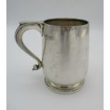 A George VI silver tankard by William Suckling Ltd, Birmingham 1941, of curved form with curved